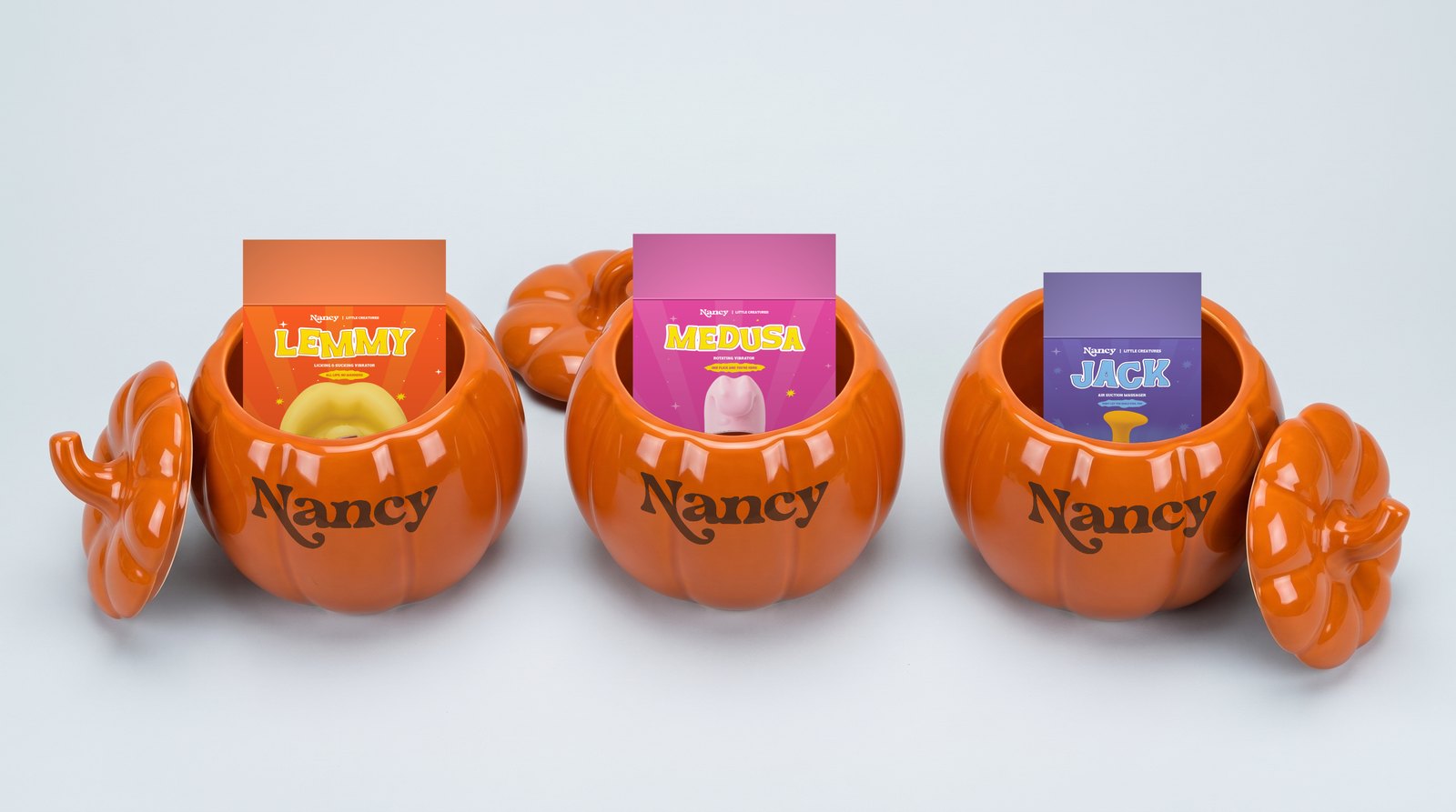 Three orange ceramic Nancy pumpkins opened to reveal the Lemmy, Medusa and Jack boxes